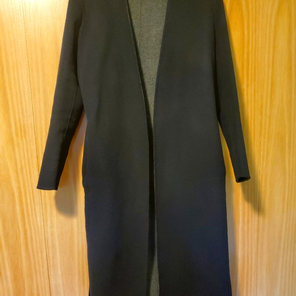 Long Vince wool wrap coat. Great for everyday or occasion.